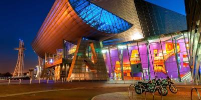 The Lowry building at night, light up