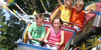 Children riding a Roller Coaster