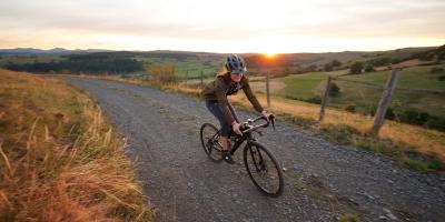 Woman riding a bike in the countryside