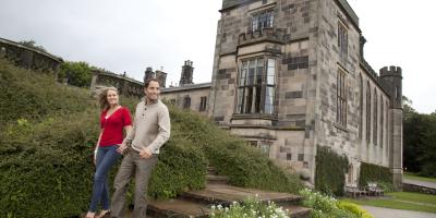 Couple walking at YHA Ilam Hall