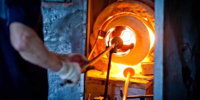 Hot glass in a glassmaker's kiln