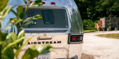 View of the back window of an Airstream at YHA Eden Project