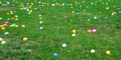 Colourful painted Easter eggs on a grass field