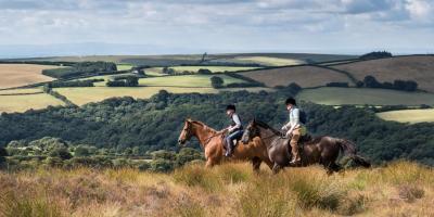 a couple of horse riders on the Devon moors