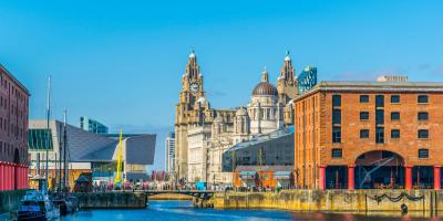 Historic docks in Liverpool Historic and modern buildings surrounding a river