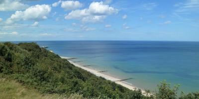 View of beach in Norfolk leading out to the sea