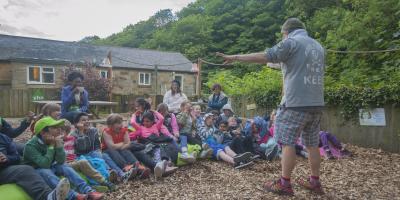 YHA leader leading a bolt-on at YHA Boggle Hole