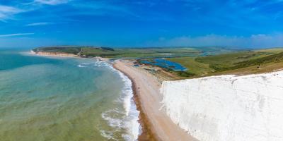 White cliffs overlooking a beach out onto the ocean