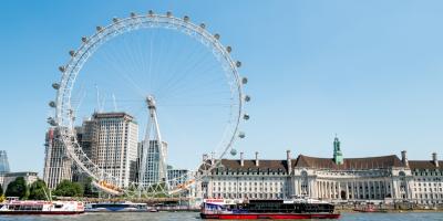 Thames river by London Eye, City Hall at Victoria Embankment in sunny summer 