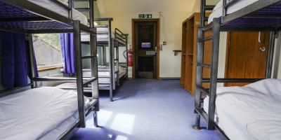 Bedroom with three sets of bunk beds