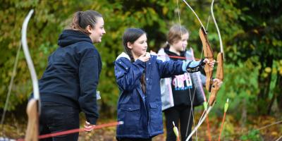 Children participating in archery activity at YHA Chester Trafford Hall