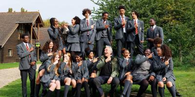 Larry Lamb with school group