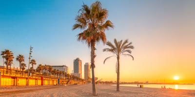 Sunsetting in the background of a beach front in Barcelona, Spain. 