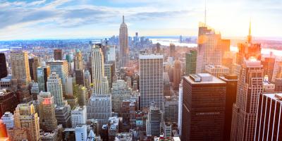 Sunsetting behind the New York skyline in America