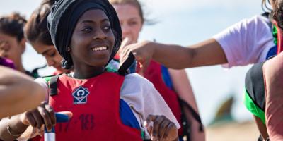 Young girl getting ready to do a water activity