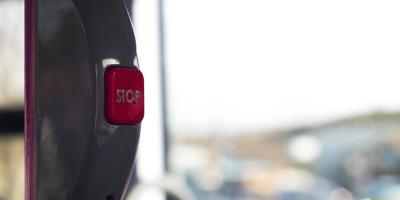 Close up shot of the bell button on the bus