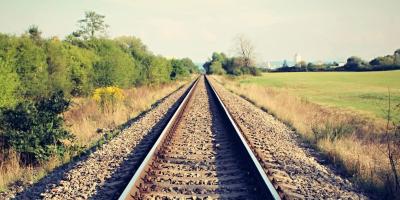 Train railway tracks on autumn landscape